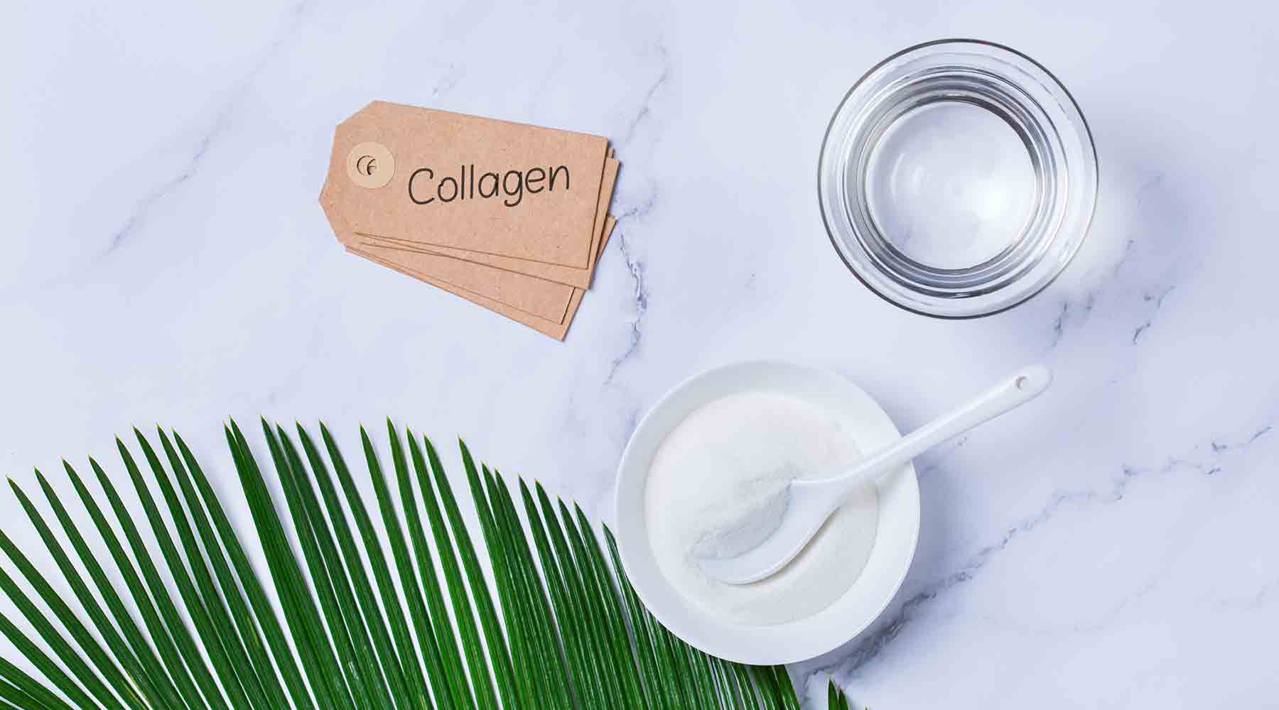 Marine collagen powder in a bowl on a white marble work top.